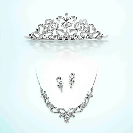 Elegant silver tiara and jewelry set with butterflies.