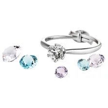 Elegant ring with assorted colorful gemstones.